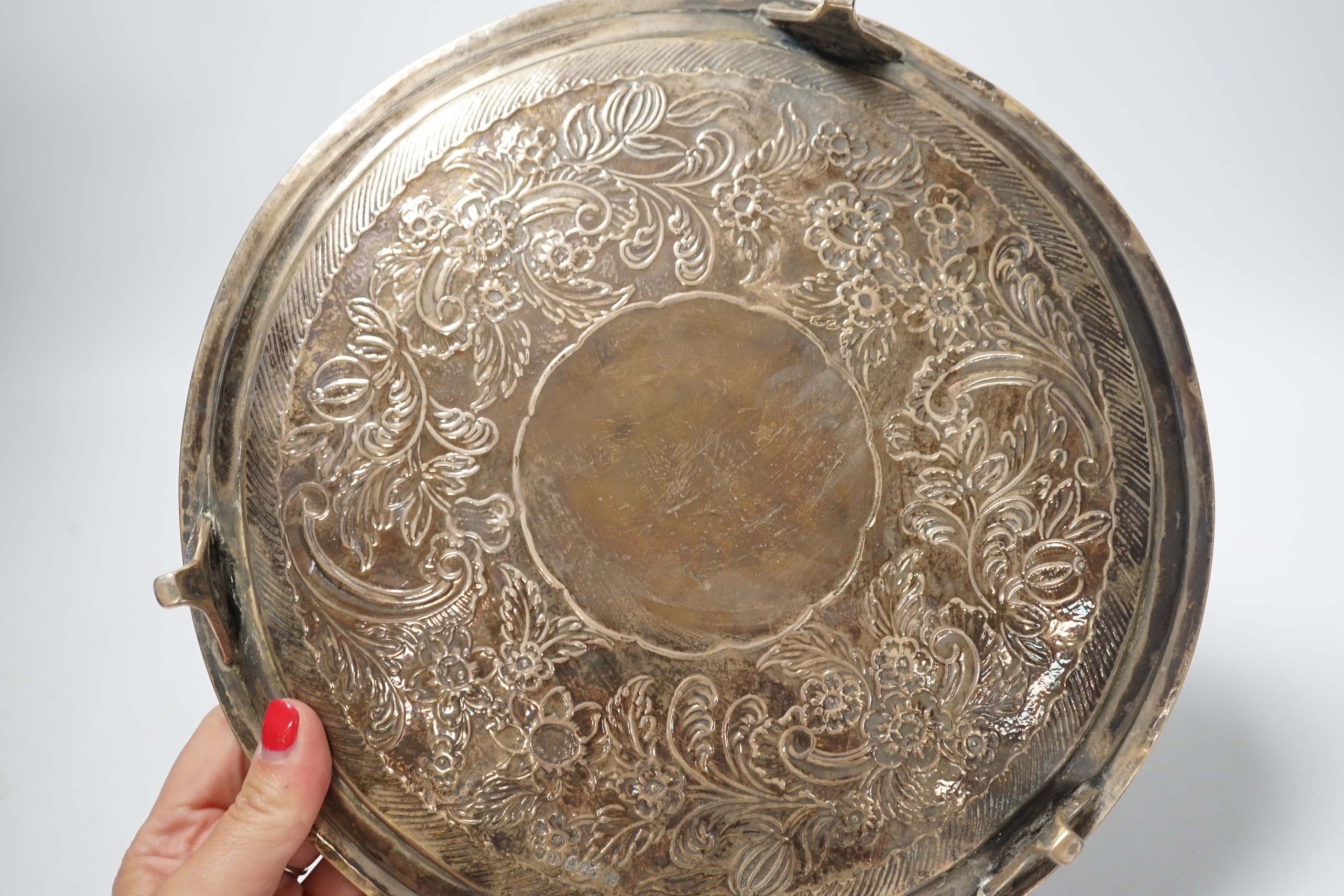 A George III silver salver, with later embossed decoration, Peter & Ann Bateman, London, 1795, 25.4cm, 16oz.